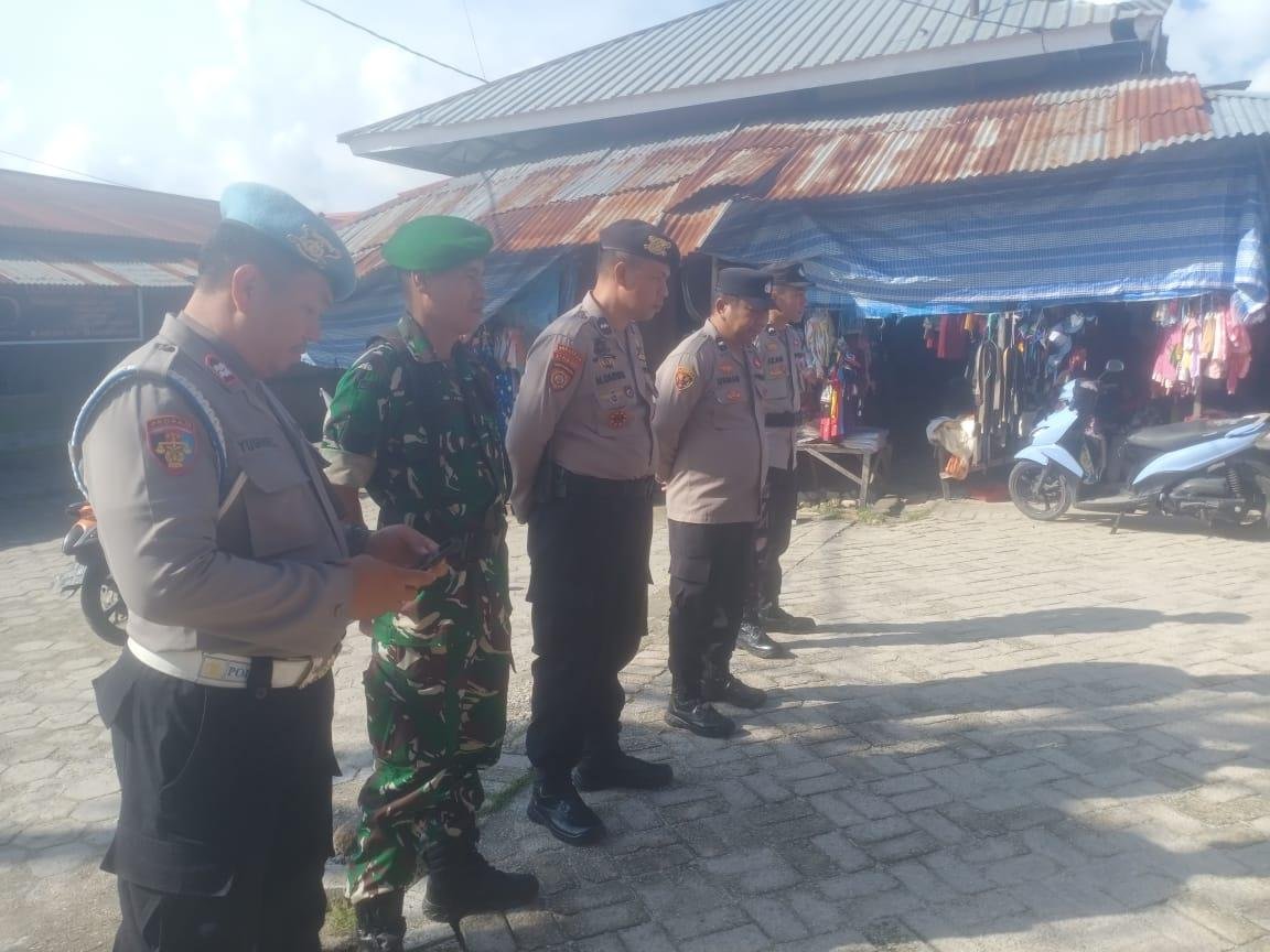 Kasipropam Polres Wakatobi Laksanakan Apel Pagi dan Pengecekan Personel Pos Pam Pasar Sentral Operasi Lilin Anoa 2025